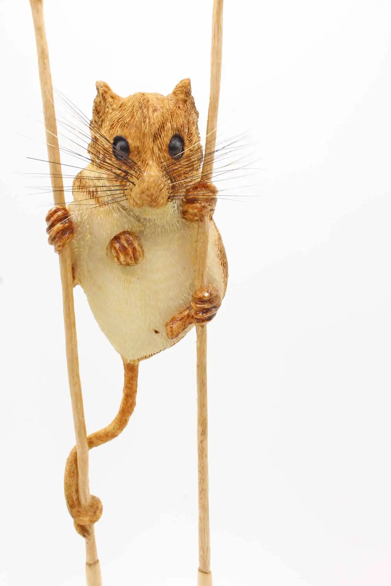 Mouse on wheat shafts woodcarving